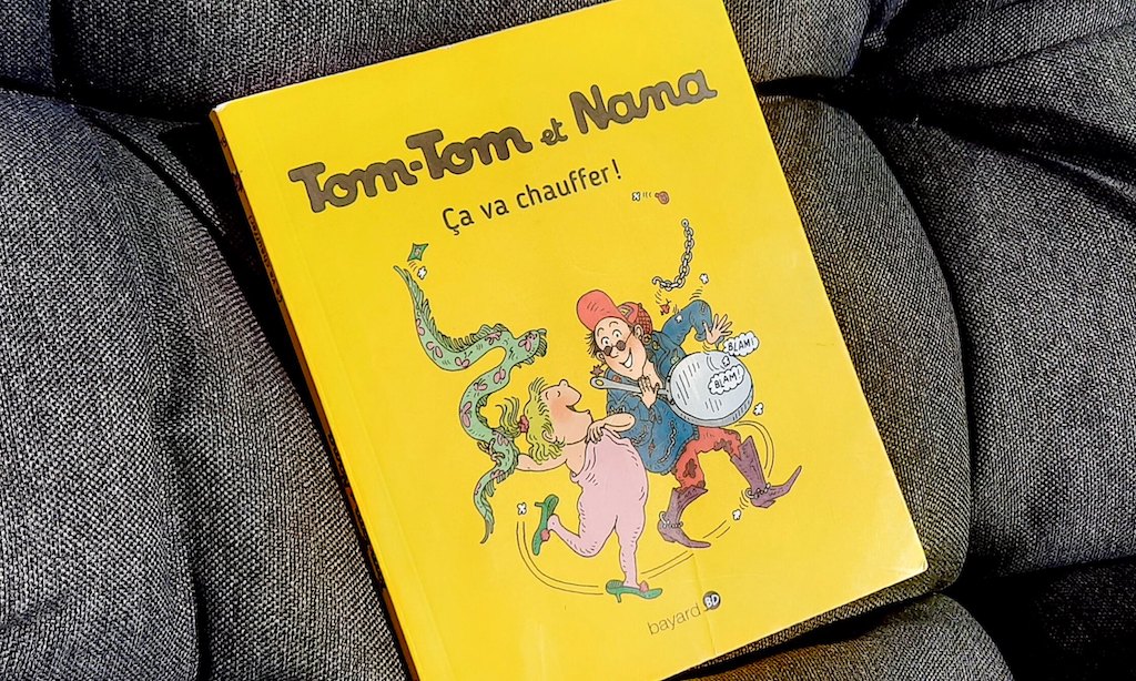 Tom-Tom and Nana comic book with yellow cover on black background