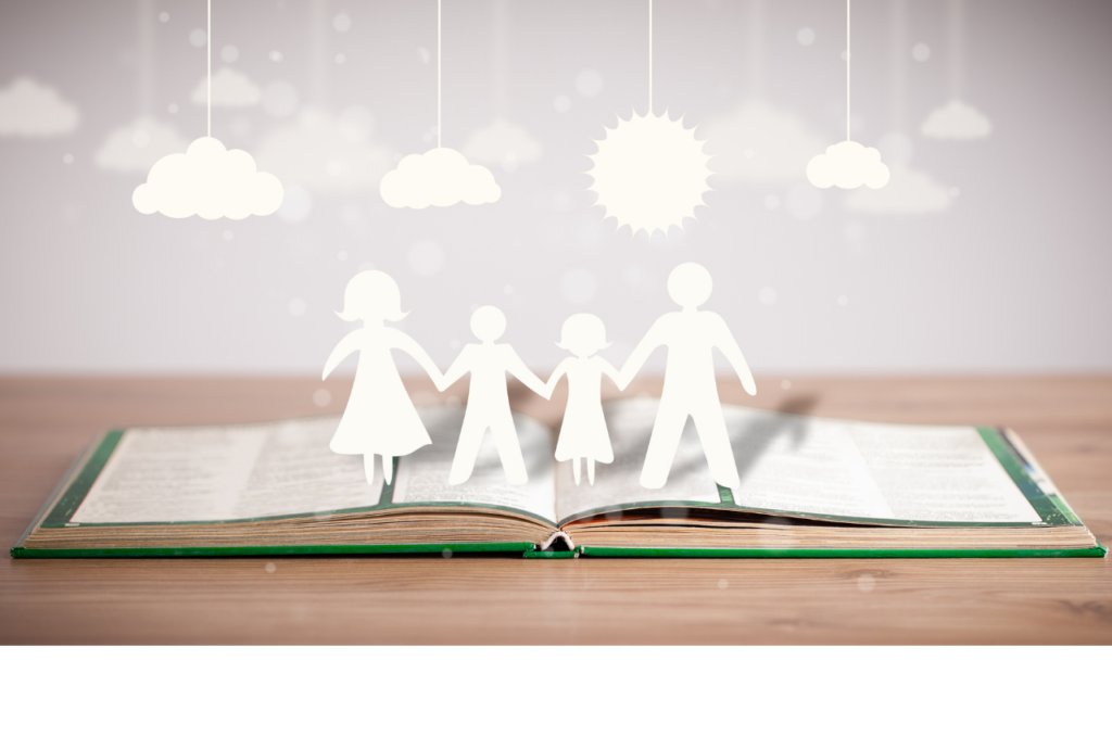 Paper family figures standing in an open book